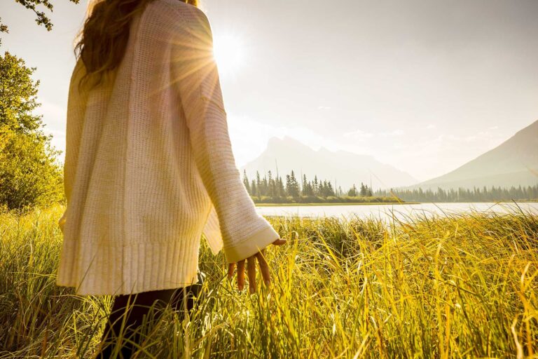 1800x1200_getty_rf_woman_walking_through_tall_grass.jpg