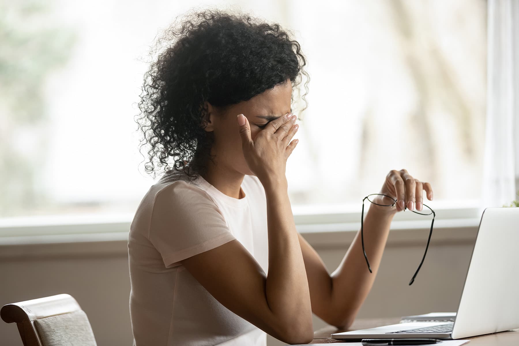 1800x1200_getty_rf_woman_with_headache.jpg